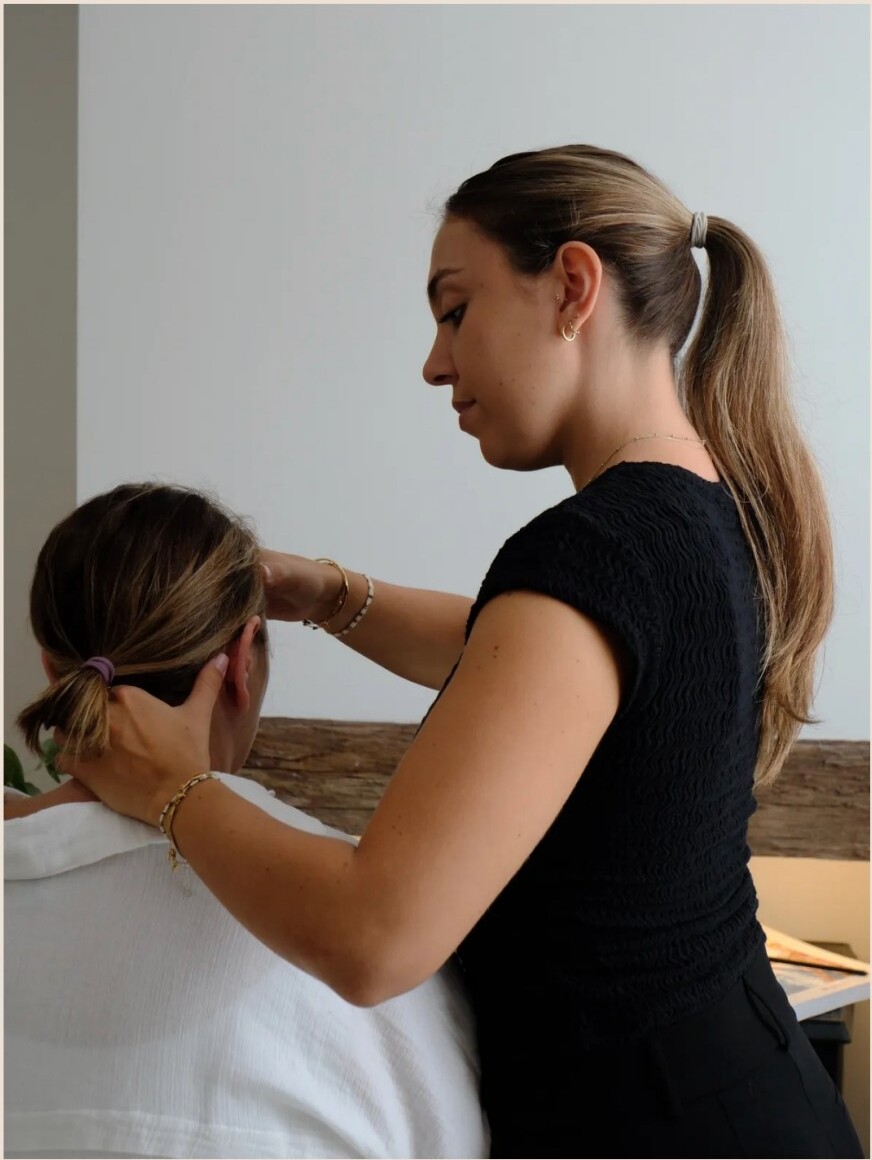 Chiropractor adjusting a patient's neck